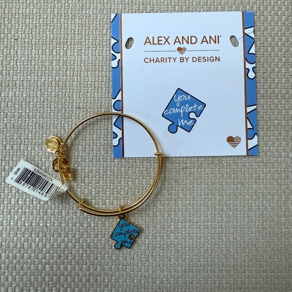 NWT Alex and Ani You Complete Me Blue Puzzle Piece Autism Shiny Gold Bracelet - Picture 2 of 4